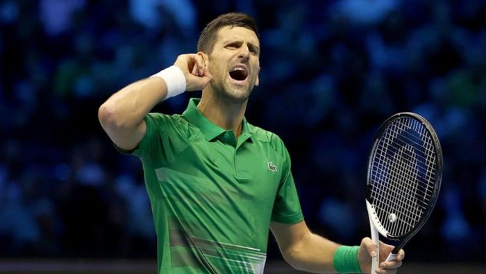 TURIN, ITALY - NOVEMBER 14: Novak Djokovic of Serbia gestures to the crowd while playing Stefanos Tsitsipas of Greece during round robin play on Day Two of the Nitto ATP Finals at Pala Alpitour on November 14, 2022 in Turin, Italy. (Photo by Matthew Stockman/Getty Images)