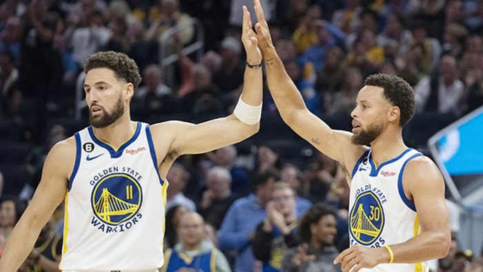 October 18, 2022; San Francisco, California, USA; Golden State Warriors guard Klay Thompson (11) high-fives guard Stephen Curry (30) against the Los Angeles Lakers during the second quarter at Chase Center. Mandatory Credit: Kyle Terada-USA TODAY Sports
