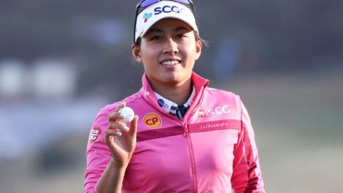 WONJU, SOUTH KOREA - OCTOBER 20: Atthaya Thitikul of Thailand reacts after sinking her putt on the 18th green during the first round of the BMW Ladies Championship at Oak Valley Country Club on October 20, 2022 in Wonju, South Korea. (Photo by Chung Sung-Jun/Getty Images)