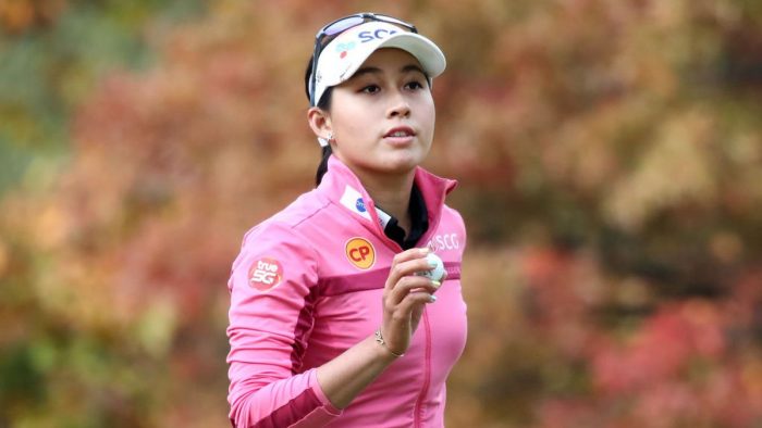 WONJU, SOUTH KOREA - OCTOBER 23: Atthaya Thitikul of Thailand acknowledges the gallery after the birdie on the 2nd green during the final round of the BMW Ladies Championship at Oak Valley Country Club on October 23, 2022 in Wonju, South Korea. (Photo by Chung Sung-Jun/Getty Images)