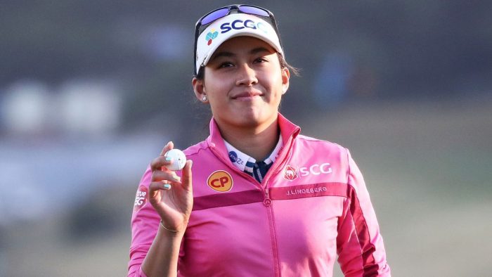 WONJU, SOUTH KOREA - OCTOBER 20: Atthaya Thitikul of Thailand reacts after sinking her putt on the 18th green during the first round of the BMW Ladies Championship at Oak Valley Country Club on October 20, 2022 in Wonju, South Korea. (Photo by Chung Sung-Jun/Getty Images)