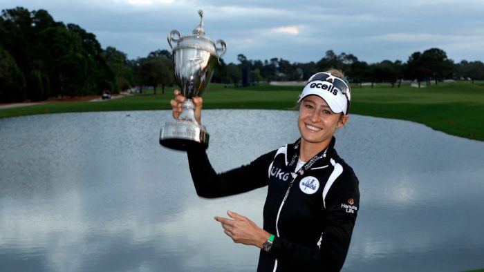 BELLEAIR, FLORIDA - NOVEMBER 13: Nelly Korda of the United States poses with the trophy after winning the Pelican Women's Championship at Pelican Golf Club on November 13, 2022 in Belleair, Florida. (Photo by Mike Ehrmann/Getty Images)
