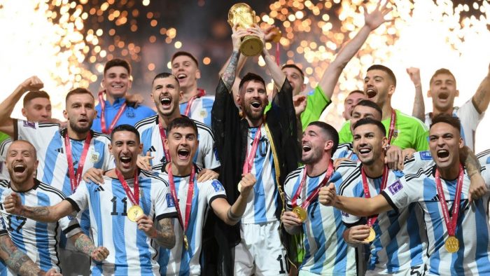LUSAIL CITY, QATAR - DECEMBER 18: Lionel Messi of Argentina lifts the FIFA World Cup Qatar 2022 Winner's Trophy after the FIFA World Cup Qatar 2022 Final match between Argentina and France at Lusail Stadium on December 18, 2022 in Lusail City, Qatar. (Photo by Shaun Botterill - FIFA/FIFA via Getty Images)