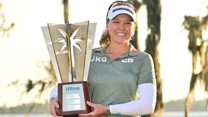 ORLANDO, FLORIDA - JANUARY 22: Brooke Henderson of Canada poses with the trophy after winning the Hilton Grand Vacations Tournament of Champions at Lake Nona Golf & Country Club on January 22, 2023 in Orlando, Florida. (Photo by Julio Aguilar/Getty Images)