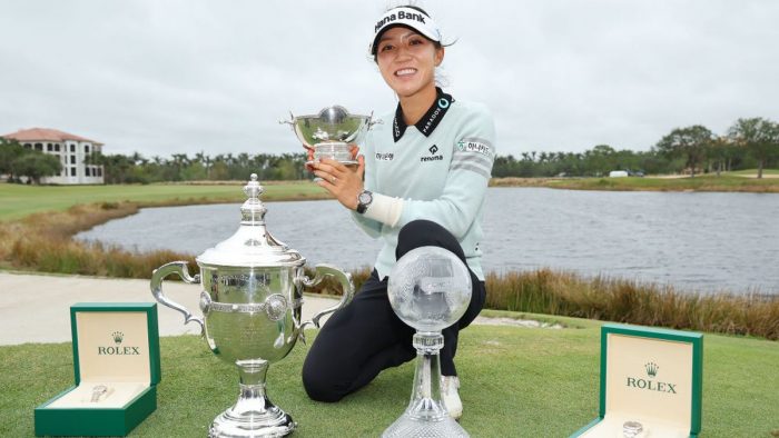 NAPLES, FLORIDA - NOVEMBER 20: Lydia Ko of New Zealand poses for a photo with the Vare Trophy, the Rolex Player of the Year trophy and the CME Globe trophy after winning the CME Group Tour Championship at Tiburon Golf Club on November 20, 2022 in Naples, Florida. (Photo by Michael Reaves/Getty Images)