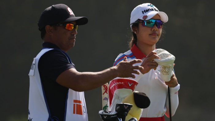LOS ANGELES, CALIFORNIA - APRIL 27: Jaravee Boonchant of Thailand selects a club from her bag on the 14th tee during the first round of the JM Eagle LA Championship presented by Plastpro at Wilshire Country Club on April 27, 2023 in Los Angeles, California. (Photo by Harry How/Getty Images)