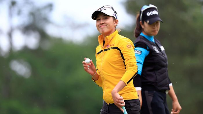THE WOODLANDS, TEXAS - APRIL 23: Atthaya Thitikul of Thailand waves alongside alk during the final round of The Chevron Championship at The Club at Carlton Woods on April 23, 2023 in The Woodlands, Texas. (Photo by Carmen Mandato/Getty Images)