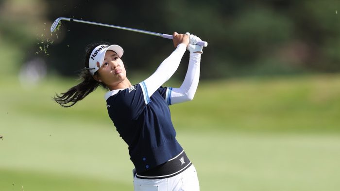 TADWORTH, ENGLAND - AUGUST 10: Jaravee Boonchant of Thailand plays her second shot on the 18th hole on Day One of the AIG Women's Open at Walton Heath Golf Club on August 10, 2023 in Tadworth, England. (Photo by Richard Heathcote/R&A/R&A via Getty Images)