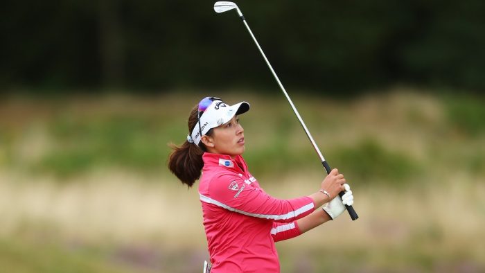 TADWORTH, ENGLAND - AUGUST 12: Atthaya Thitikul of Thailand plays a shot on the 4th hole on Day Three of the AIG Women's Open at Walton Heath Golf Club on August 12, 2023 in Tadworth, England. (Photo by Chloe Knott/R&A/R&A via Getty Images)