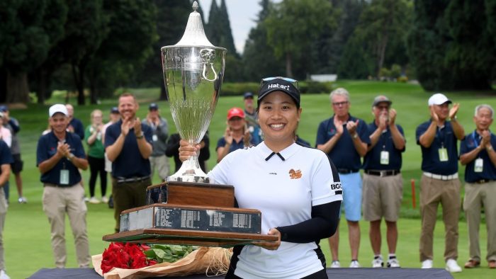 PORTLAND, OREGON - SEPTEMBER 03: Chanettee Wannasaen of Thailand poses with the championship trophy after winning the Portland Classic at Columbia Edgewater Country Club on September 03, 2023 in Portland, Oregon. (Photo by Steve Dykes/Getty Images)