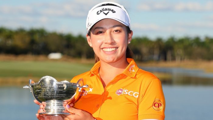 NAPLES, FLORIDA - NOVEMBER 19: Atthaya Thitikul of Thailand celebrate with the Vare trophy after the CME Group Tour Championship at Tiburon Golf Club on November 19, 2023 in Naples, Florida. (Photo by Michael Reaves/Getty Images)