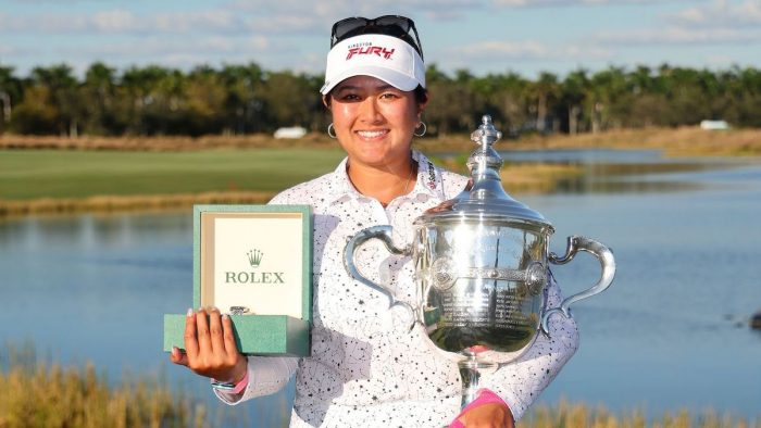 NAPLES, FLORIDA - NOVEMBER 19: Lilia Vu of the United States poses with the Rolex Player of the Year trophy and her Rolex after the CME Group Tour Championship at Tiburon Golf Club on November 19, 2023 in Naples, Florida. (Photo by Michael Reaves/Getty Images)