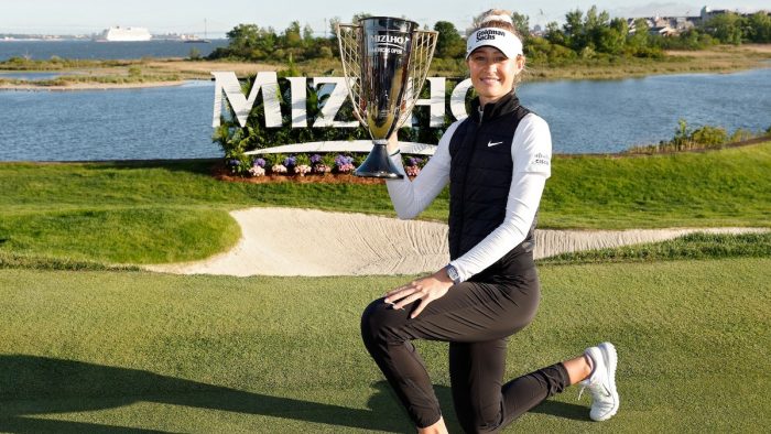 JERSEY CITY, NEW JERSEY - MAY 19: Nelly Korda of the United States poses with the winner‚Äôs trophy after winning the Mizuho Americas Open at Liberty National Golf Club on May 19, 2024 in Jersey City, New Jersey. (Photo by Sarah Stier/Getty Images)