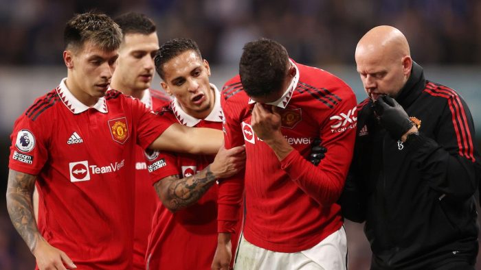 LONDON, ENGLAND - OCTOBER 22: Raphael Varane of Manchester United shows emotion as he leaves the pitch with an injury during the Premier League match between Chelsea FC and Manchester United at Stamford Bridge on October 22, 2022 in London, England. (Photo by Alex Pantling/Getty Images)