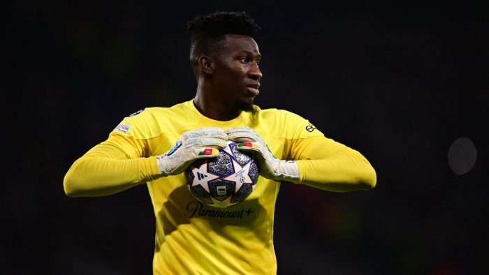 Inter Milan's Cameroonian goalkeeper #24 Andre Onana holds onto the ball during the UEFA Champions League final football match between Inter Milan and Manchester City at the Ataturk Olympic Stadium in Istanbul, on June 10, 2023. (Photo by Marco BERTORELLO / AFP) (Photo by MARCO BERTORELLO/AFP via Getty Images)