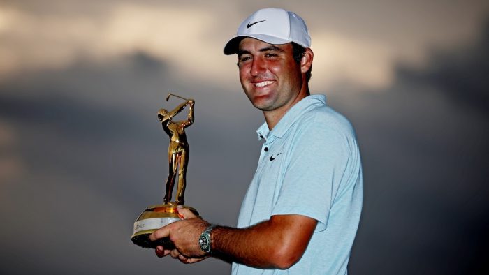 PONTE VEDRA BEACH, FLORIDA - MARCH 12: Scottie Scheffler poses with the tournament trophy after winning THE PLAYERS Championship at Stadium Course at TPC Sawgrass on March 12, 2023 in Ponte Vedra Beach, Florida. (Photo by James Gilbert/PGA TOUR via Getty Images)