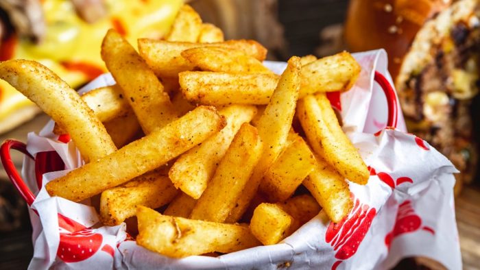 side-view-french-fries-with-seasoning-min